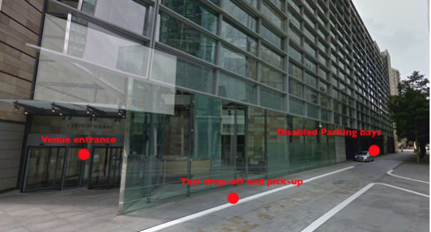 A photograph of the exterior of the venue, showing where taxi drop-off and disabled parking are located